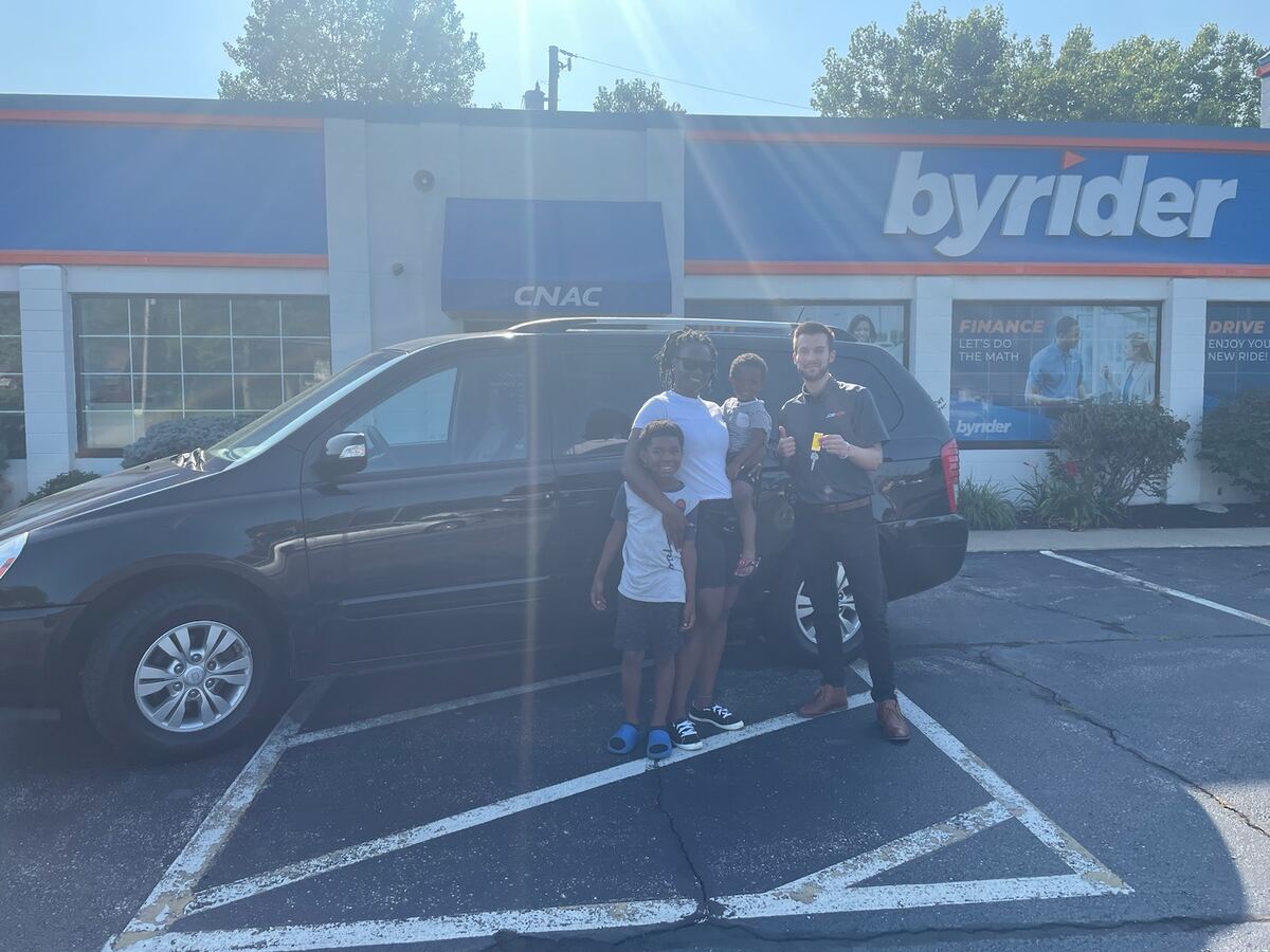 York with a customer and her family at delivery