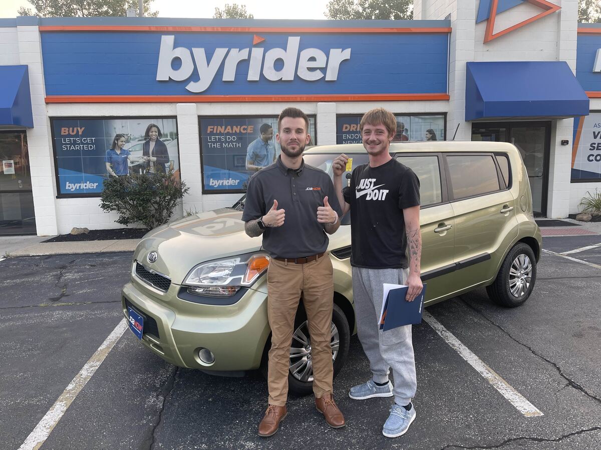 York with a customer and a new car